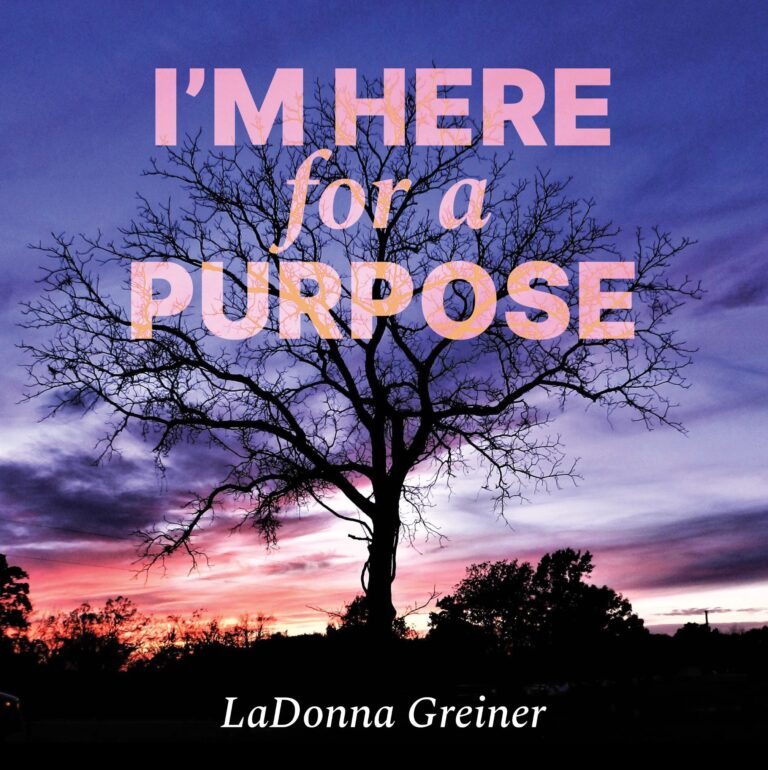 Book Cover: I'm Here for a Purpose. Naked walnut tree silhouetted against a sunset sky of purples, pinks and white. Author & Photographer LaDonna Greiner